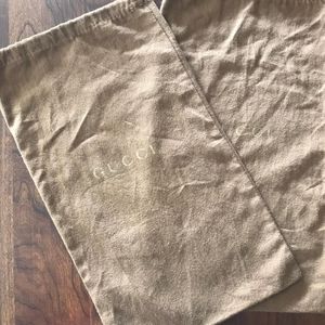 Two gucci shoe size dust bags